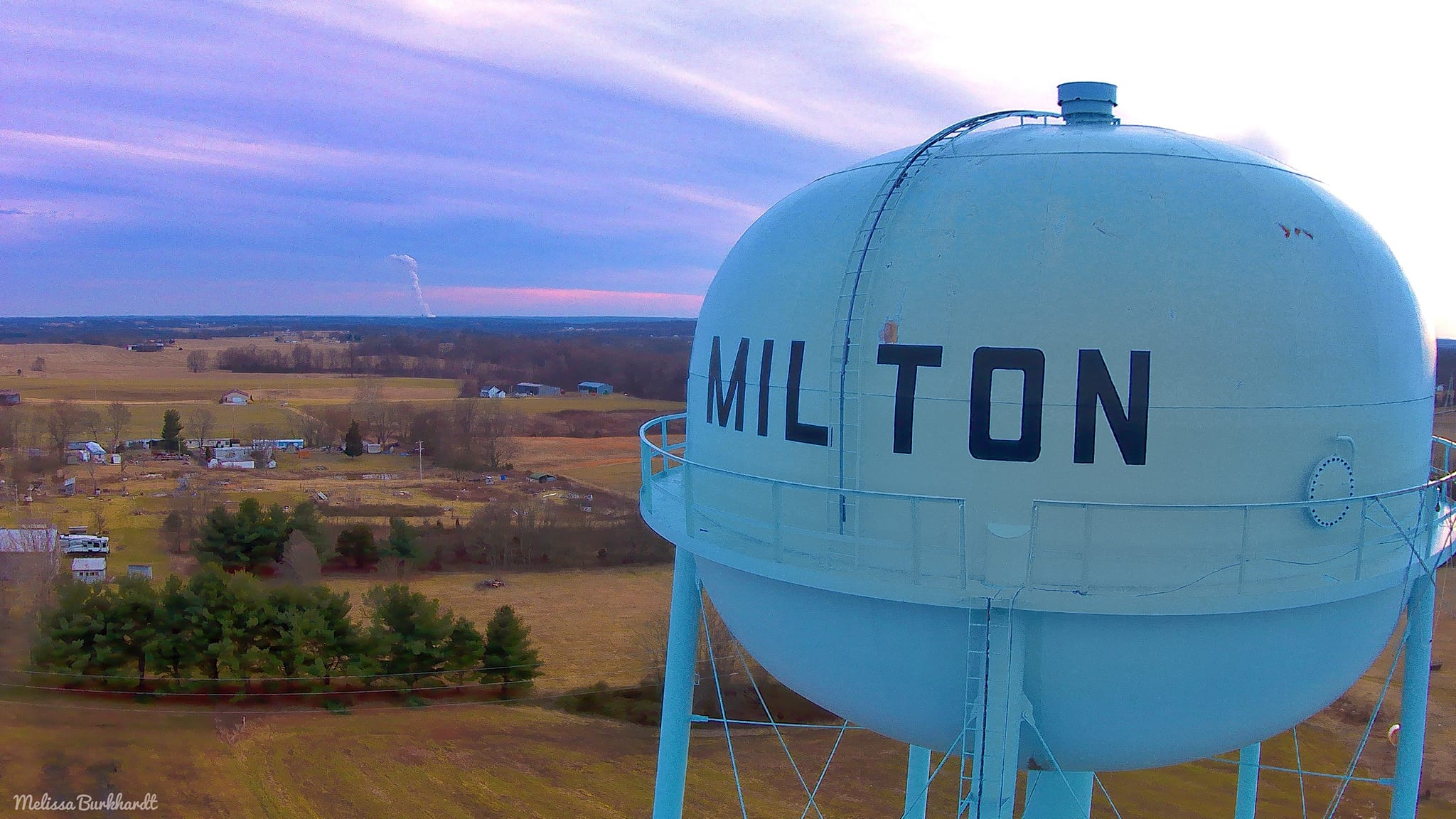 A close up of Milton written on the water tower overlooking part of town.